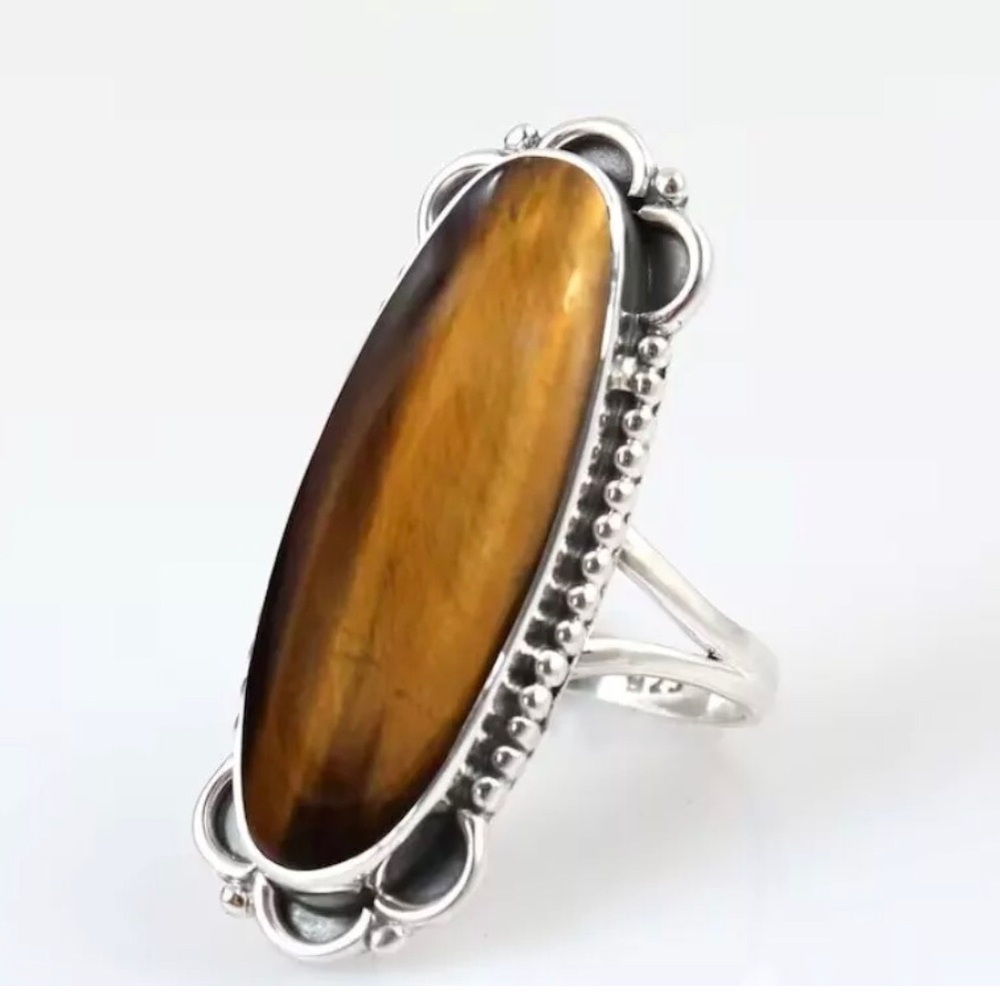 925 Silver and Tigers Eye Stone Women's Ring and matching ear rings.